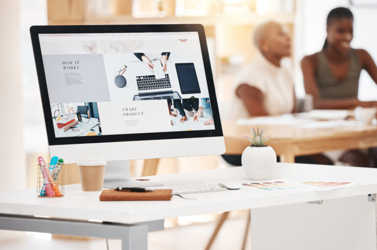 Graphic design, website, and marketing with an advertising campaign on the screen