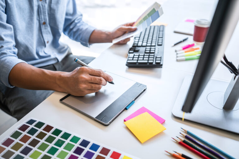person sketching and doing branding for marketing