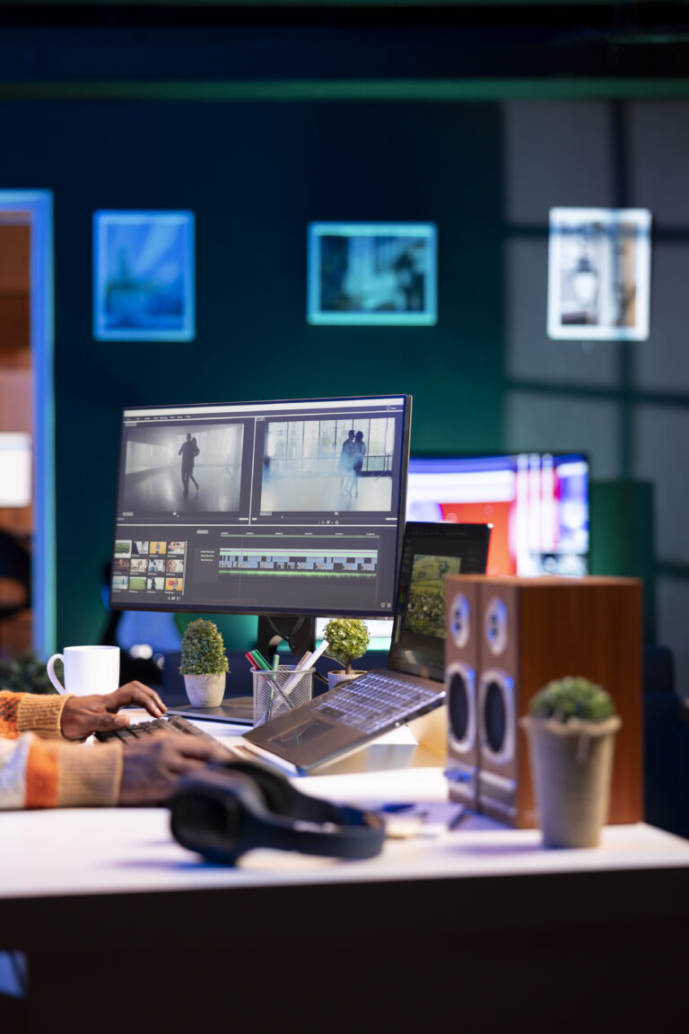 Video maker producing footage with artistic editing software, doing color adjustment and special effects. Digital videographer illustrator developing transitions for cinematic production.